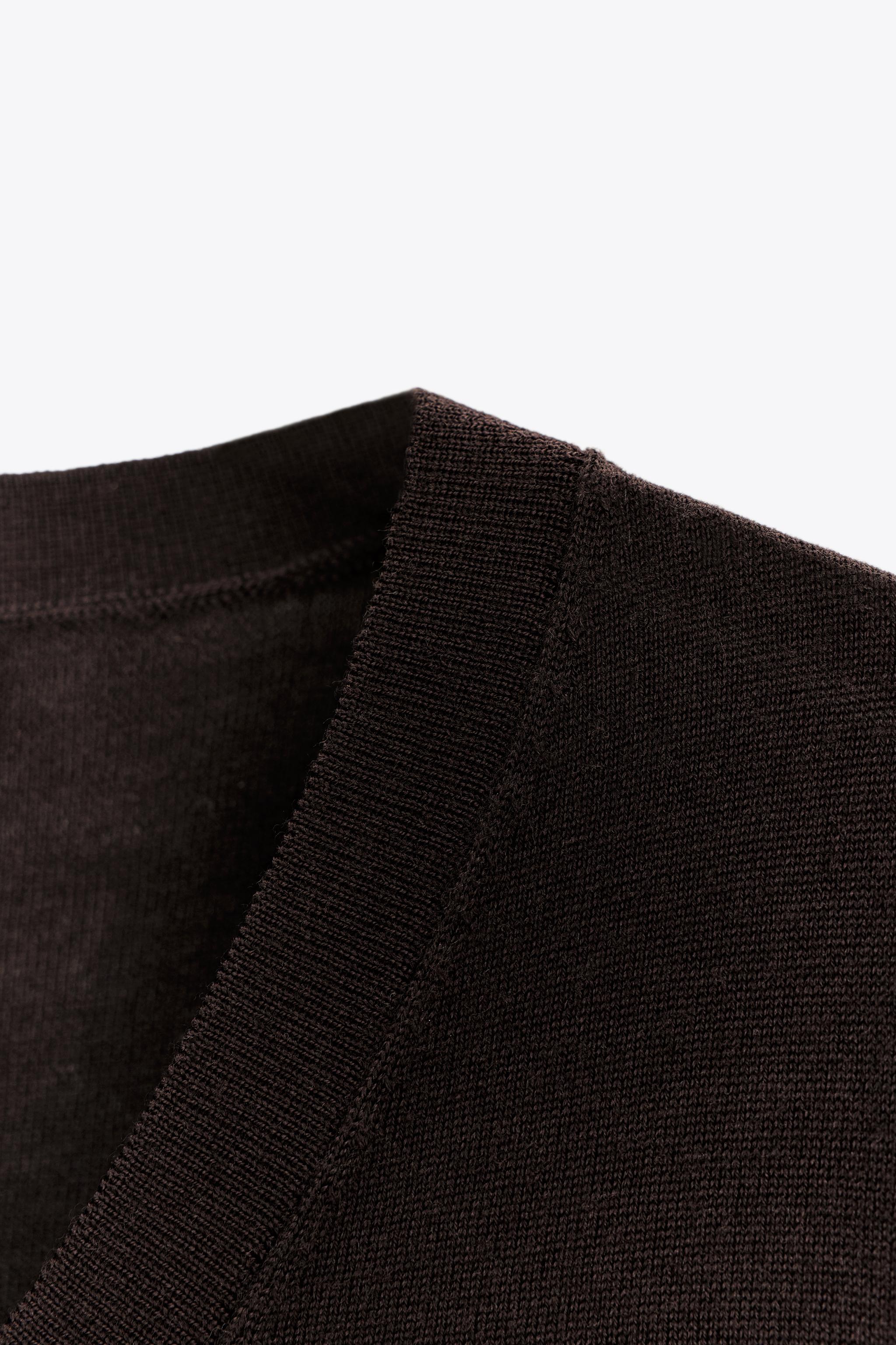 100% WOOL SHORT SLEEVE SWEATER